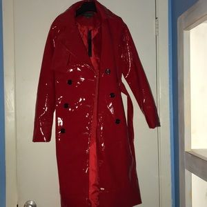 Bright red latex trench coat